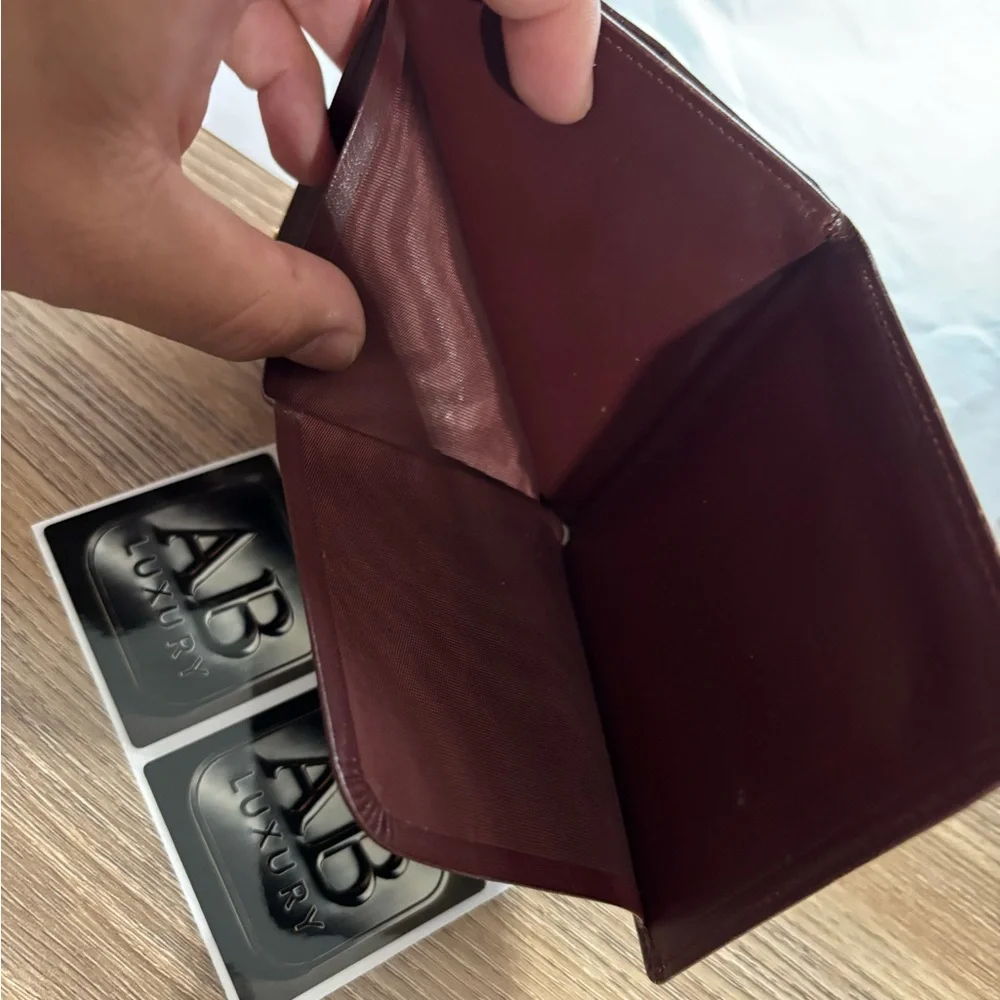 Cartier Burgundy Leather Card Holder with Gold Accents